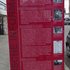 Eine große rote Stele mit Informationen und Bildern zu Erich Fellgiebel.