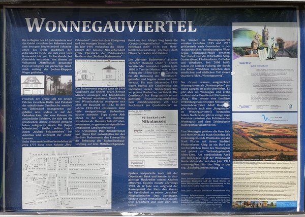Großes Informationstafel mit Texten, historischen Fotos und Karten zum Wonnegauviertel und Pfeddersheimer Weg